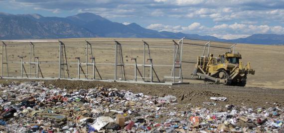 Pictured: A Cat D-8 with trash rack re-positioning The BULL for the day's wind.